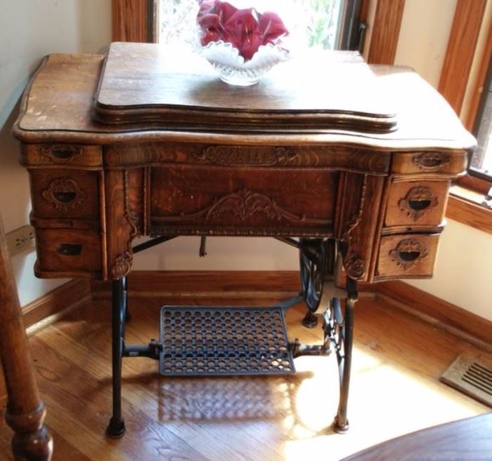 Treadle sewing machine is a nice project piece for refinishing or repurposing