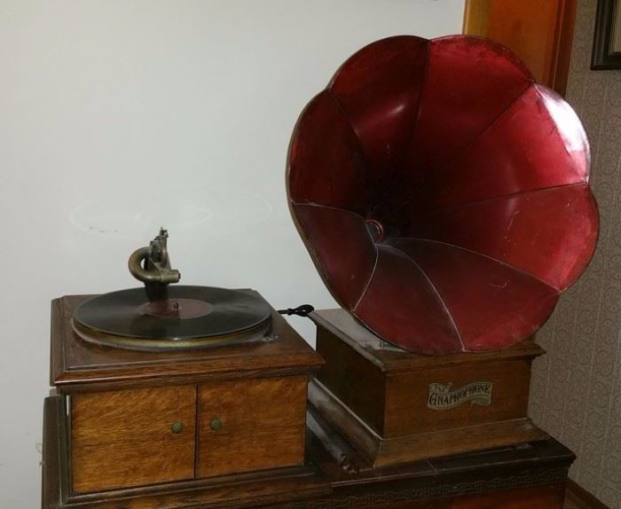 Another Victor Talking Machine and a Columbia Graphophone record player with awesome red horn