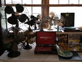 Vintage fans including Emerson, GE, RM Banner, Eskimo. Master Violet Ray No. 11. Park Ridge memorabilia