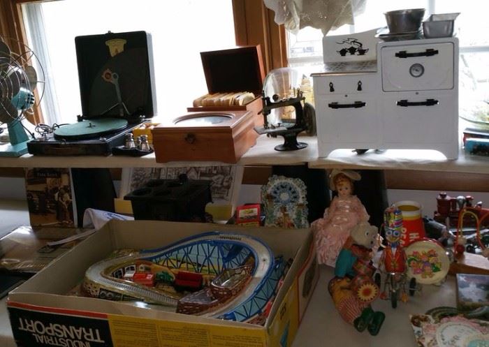 Technofix Industrial Transport vintage toy. New and older key winds, Antique Singer toy sewing machine, great tin toy stove. Thorens Disc Music box, Polly Portable Phonograph.