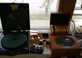 Polly Portable Phonograph, opera glasses, Thorens disc music box comes with an assortment of discs