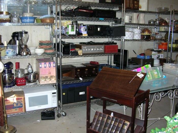 Book stand, kitchen appliances, vintage Pyrex storage, microwave, electronics