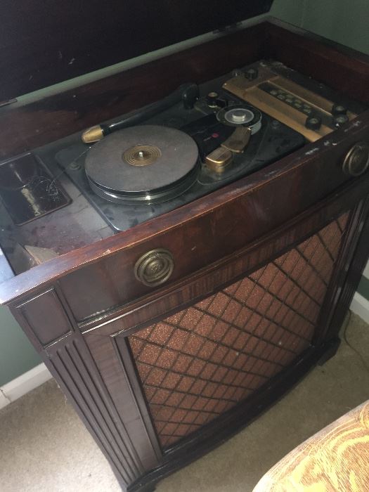 Antique phonograph and wire recorder with original paperwork and wire.