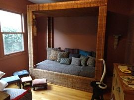 Twin canopy bed from Australia; pillows; footstools