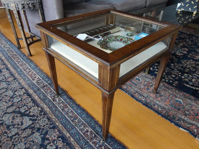 Mahogany display table; semi-antique Persian Malayar runner; semi-antique Persian Sarouk rug