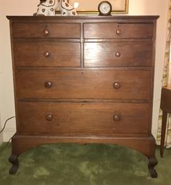 North Carolina - possibly Mecklenburg or Cabarrus County - early 1800s - walnut chest on frame. Two short drawers on the right have a false double front to expose one deep bonnet drawer. Cabriole legs and trifid feet. Great piece of Southern furniture.