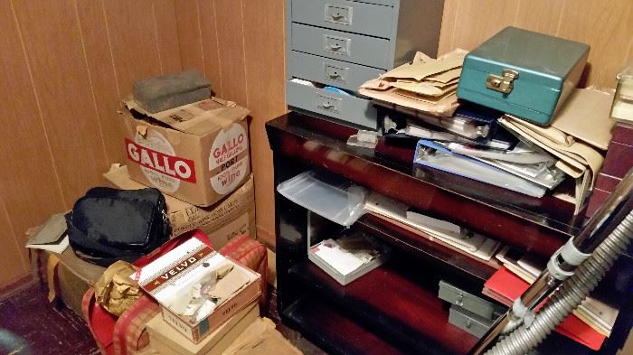 These boxes of coins and stamps have been moved to main level of house.