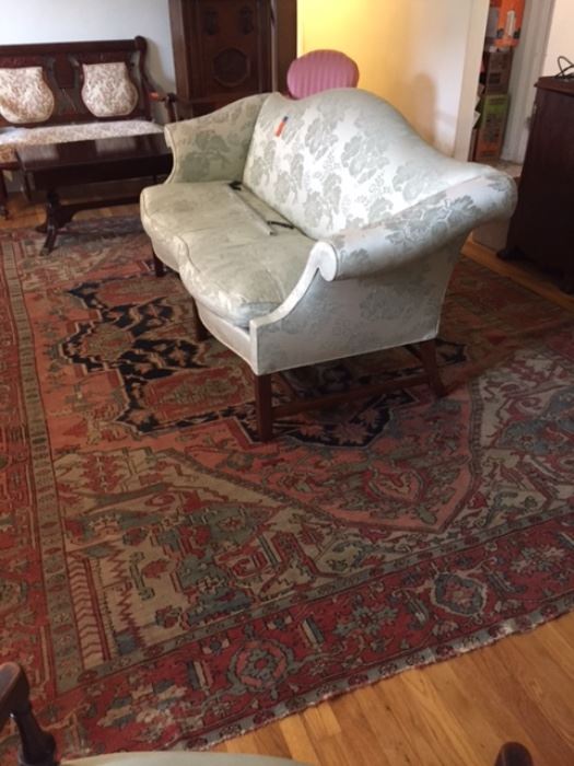 Damask sofa. Rug sold 
