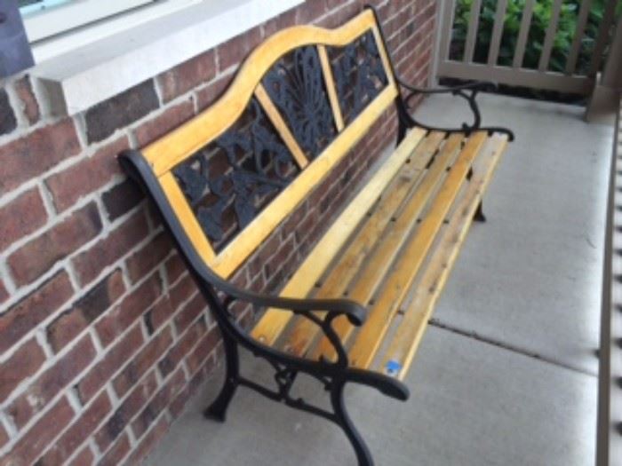 Iron and wood garden bench