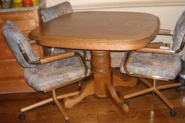 Dining table with 4 chairs and 2 leaves.  Very nice condition.