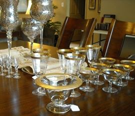 Tiffin style elegant glassware with gold band.