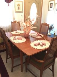 Vintage maple dining table, 6 cane back high chairs and table leaf, in excellent condition! Smoke free home