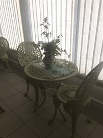 Cast iron bistro table and chairs