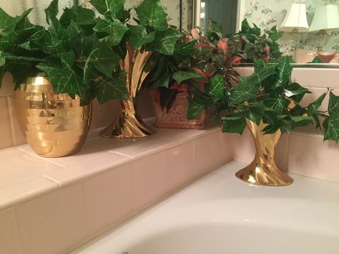 brass vases and silk plants
