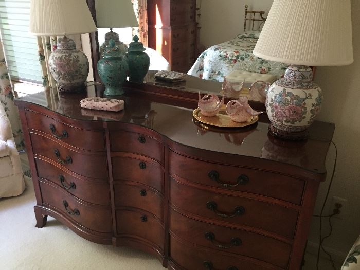 Curved front mahogany 12-drawer dresser and mirror, lamps, urns, glassware and more!