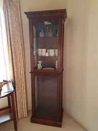 Another curio cabinet