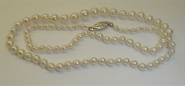 Graduated pearl necklace with 14k white gold clasp. 17.5"