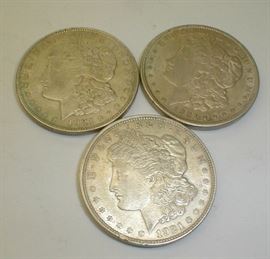Three 1921 Morgan Silver dollars. All at least XF. One has flaw on rim