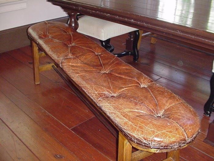Close-up of one of the leather benches