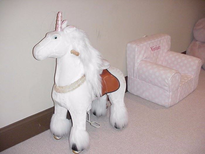 Stuffed unicorn; chair