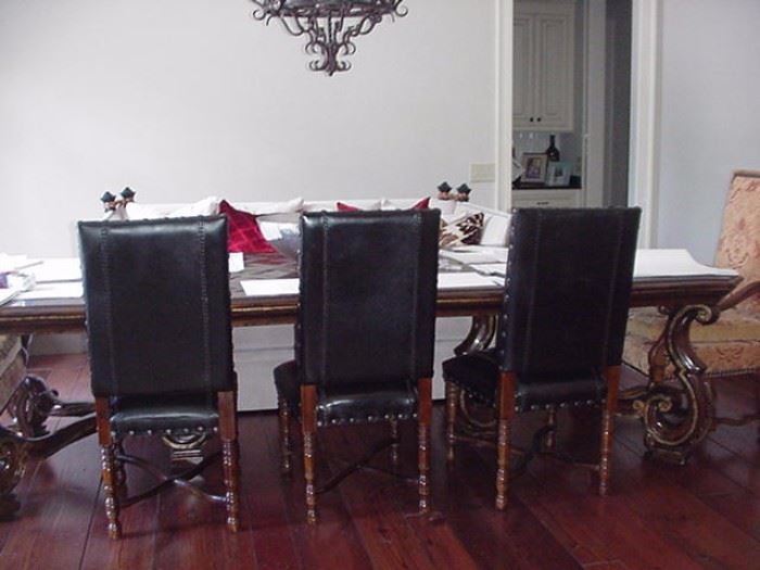 Three leather ujpholstered chairs, also Marge Carson