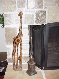 Fireplace decorative accessories; obelisk; carved giraffes from Africa