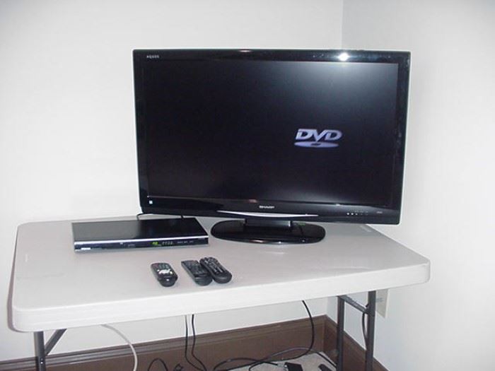 Sharp flat screen television; DVD player