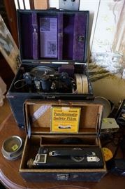 Antique movie projector and camera with accessories