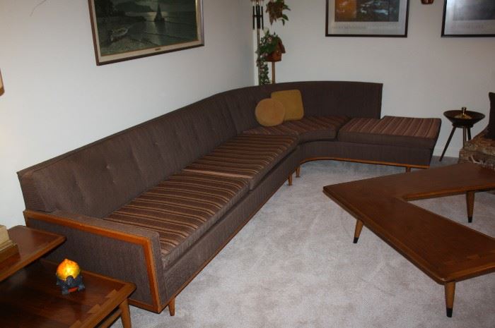 Great mid-century sofa.  Pillows are interchangable with stripes on one side and solid on the other.