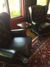 pair of great leather wing chairs in home office