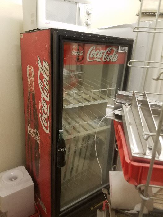 Coca-Cola Cooler over six feet tall, could be used for man cave or commercial uses. This is not a vending machine, it is a full length cooler for drinks and snacks