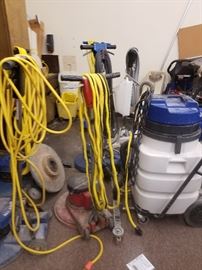 floor buffers, old and dusty, but still work with cords and electrical connections