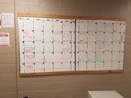 white boards for scheduling and controlling work flow