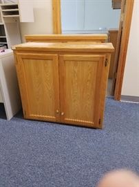 bright blonde colored storage cabinet