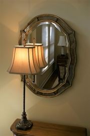 Framed wall mirror, lamp