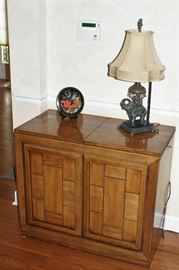 Wood cabinet with fold out top