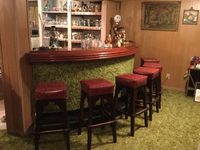 Fabulous mahogany curved bar was manufactured and built in Chicago for Club Lido in South Bend. Later, it was purchased by the Sundowner Bar in Stevensville. After several years, this bar was headed for the dumpster but was rescued by the current owner's father who brought it to its present home.