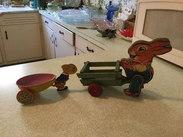 Antique wood bunny and J Chein tin bunny