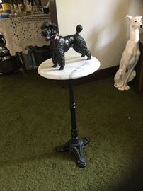 Marble top table with cast iron base