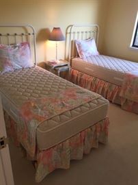Twin Beds with White Iron Headboards