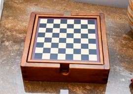 Checkerboard with Various Games Stored Underneath