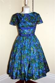 1950s cold pressed allover floral print for and flare dress.