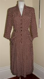 Vintage 1940s-1950s silk polka dot dress.  Large hip pockets.