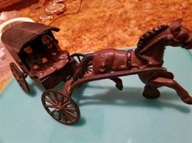 Miniature cast iron horse, buggy, and family