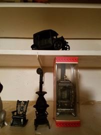 Miniature cast iron car and potbelly stoves