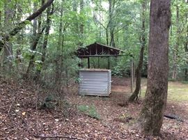 OPEN COVERED SHED IN THE BACK TO BE SOLD WITH THE PROPERTY