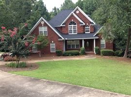 FRONT SIDE OF HOME WITH MASTER ON THE MAIN AND HUGE BATH, 2 BEDROOMS AND BATH, BONUS ROOM AND BEDROOM AND BATH IN THE BASEMENT