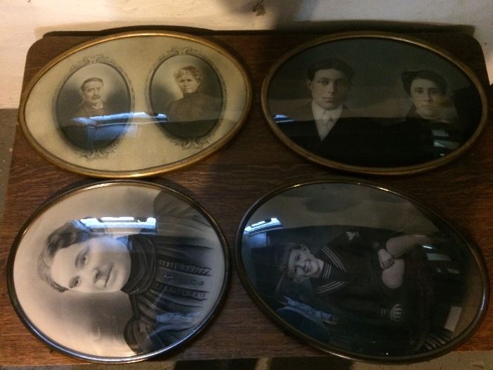 Antique Family Pictures in Oval Metal Frames and Curved Glass