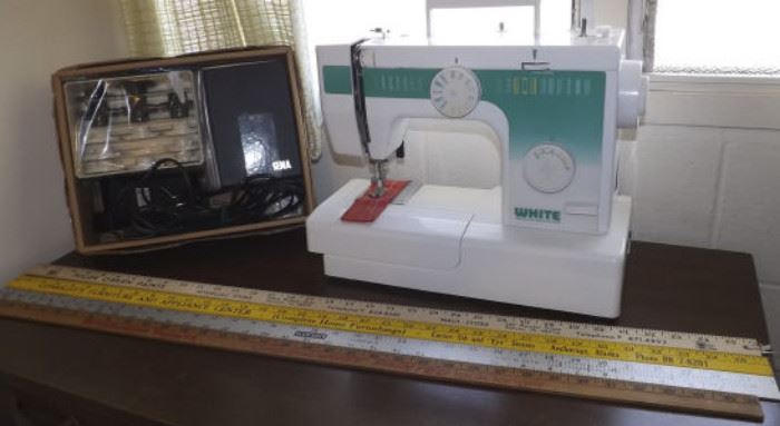 FVM041 White Sewing Machine and Yard Sticks
