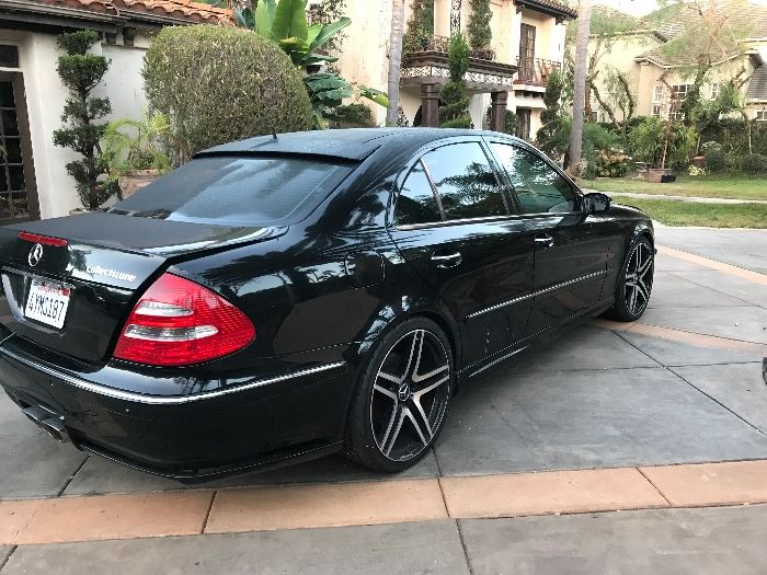 2003 Mercedes $8,000 owner by former major athlete in LA 93,000 Late edition add Mercedes 2003  E500, pitch black Exterior with tint and Black interior with Burl walnut wood, Always garaged and meticulously cared for.  Often mistaken for a brand new customized sedan. Fully loaded 5.0 Liter Engine with 329 horsepower (060in under 5.8 seconds) Sports Package with upgraded sports dash, and sculpted side skirts, brand new Upgraded 20" AMG Sports Rims, Upgraded Multimedia AV Navigation Receiver, 12 speaker system with Kenwood Amp and customized system by Auto Sound Innovations, Customized Exhaust system by Collectizone LED Taillights, 4 zone climate control, panoramic Roof with Solar Cell powered ventilation fan - cool the car on hot days! Tinted windows, power everything and it works!  Brand Bew MT549/H* Absorbed Glass mat (AGM) Automotive Battery by Interstate Batteries (30 month replacement waranty) original leather, owners manual, Clean Title and CARFAX 

 93,000 miles- previous owner m